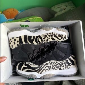 Women’s Jordan 11 retro “Animal Instinct”